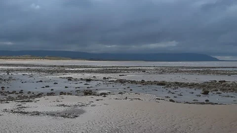 Beach with view of mountain range Stock Footage 202068376