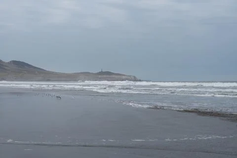 Beach with a view of ocean waves  Stock Photos