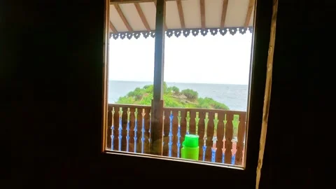 Beach view outside from hotel room window Video stock 166373136