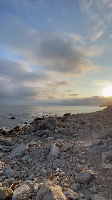 Beach View of the Pacific Ocean and Storm Clouds Breaking Waves and Cliffs Stock Footage 244094043