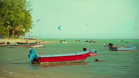Beach view with palm trees blue sky boats sea clouds in the sky vacation island Stock Footage 300754484