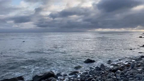 Beach View From Rocky Beach During Sunset Pacific Ocean Storm Clouds Cliffs Stock Footage 244094252
