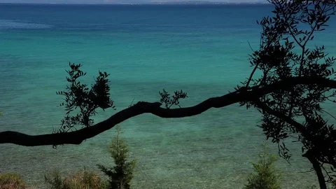 Beach view a sunny day with calm sea and beautiful colors Stock Footage 80522277