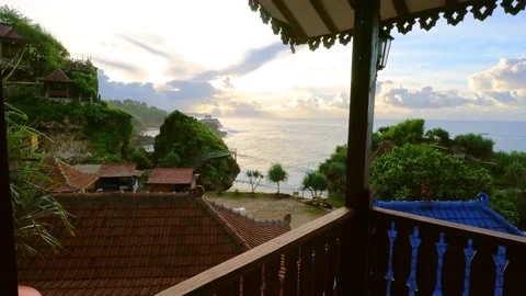 Beach view with sunset sky seen from hotel balcony Video stock 166373909