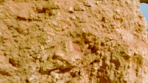 Beach view through rock arch Stock Footage 128396521