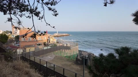 Beach view from the walk way bridge at Cheongsapo Station in Busan, South Kor Stock Footage 279456248