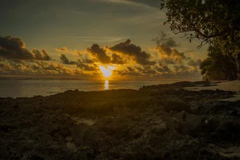 Beach view while sunset in Indonesia Stock Photos