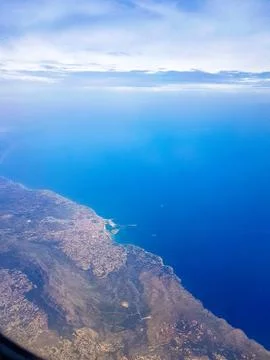 Beach, view from the window of the aircraft. Stock Photos