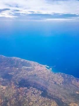 Beach, view from the window of the aircraft. Stock Photos