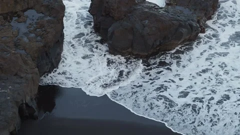 Beach with volcanic black sand Stock Footage 254485571