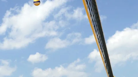 Beach volleyball over the net Stock Footage 50437466
