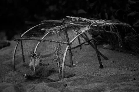 Beach washed up cage  Stock Photos