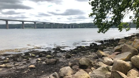 Beach Water Rocks Bridge Clouds 4K Nature Fjord Stock Footage 114772175
