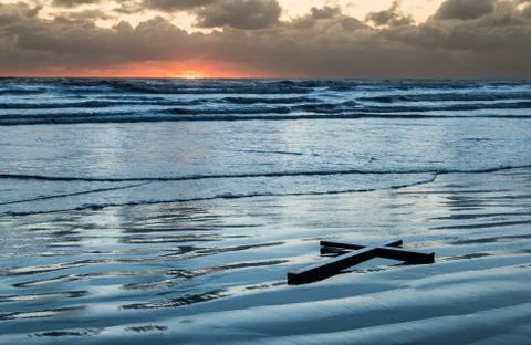 Beach Waters Cross Stock Photos