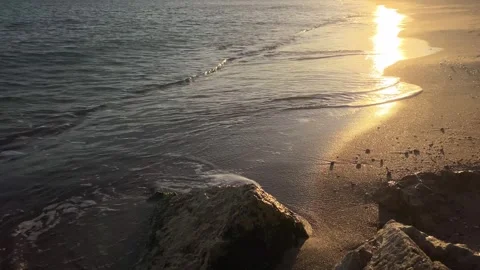 Beach with wave and sands on sunset Black Sea diagonally composition Stock Footage 259697139