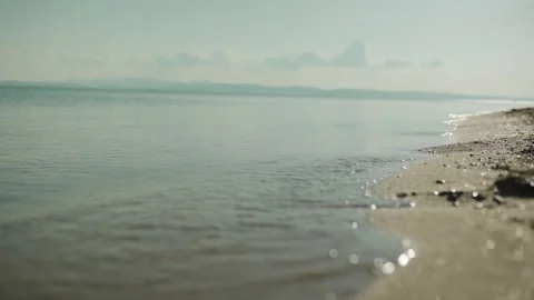 Beach Wave Splashing Macro In Sunset 4K Video Stock Footage 252620698