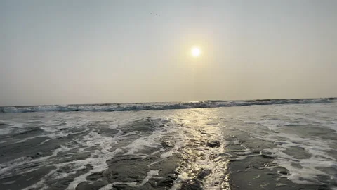 Beach wave splashing at sunset Stock Footage 209124283