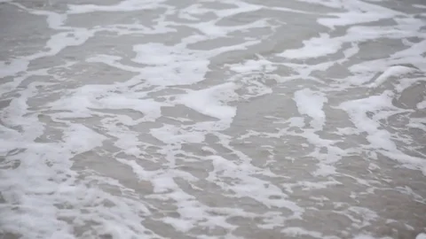 Beach wave then blur focus Stock Footage 75770404