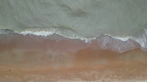 A beach with a wave in the water Video stock 317258449