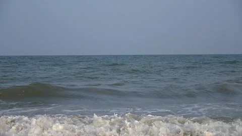 Beach waves against blue sky, Mahabalipuram, Tamilnadu Stock Footage 156904658