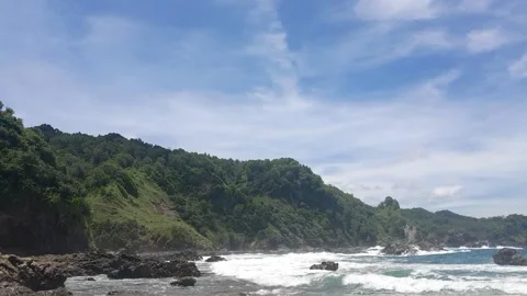 Beach, waves and mountain Stock Footage 317614810