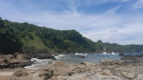 Beach, waves and mountain Stock Footage 317614885