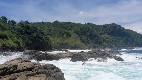 Beach, waves and mountain Stock Footage 317614886
