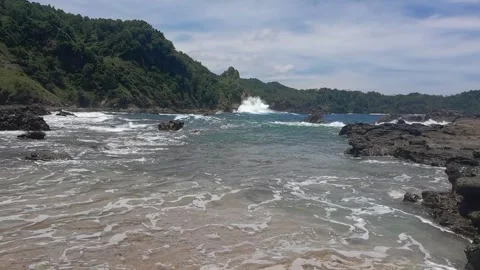 Beach, waves and mountain Stock Footage 317614888