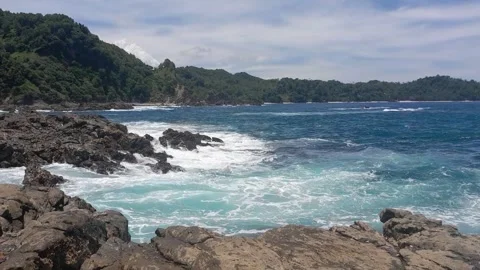 Beach, waves and mountain Stock Footage 317614927