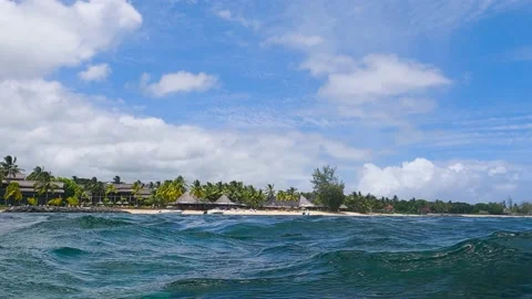 On the beach, in the waves at Bel Ombre, Mauritius Stock Footage 199440660
