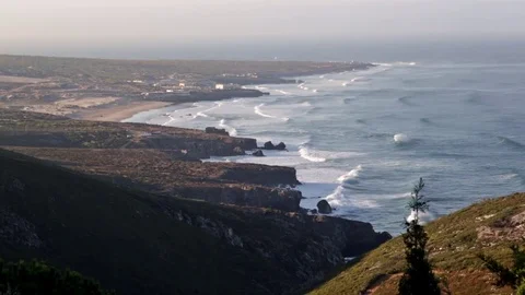 Beach waves from a cliff Stock Footage 83929445