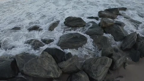 Beach Waves Crashing over Rocks (4K) Stock Footage 259929893