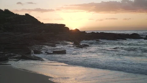 Beach waves at dawn Stock Footage 107075229