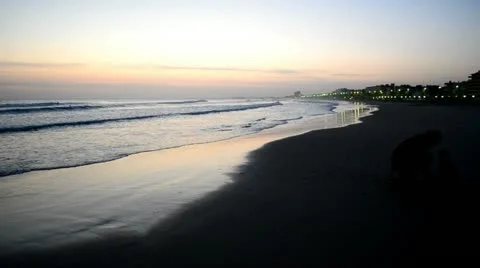 Beach waves during sunset 1 Stock-Footage 12613881