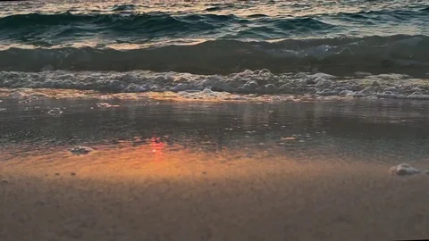 Beach waves during sunset Stock Footage 101370634