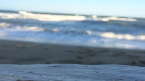 Beach waves with emerging man Stockbeeldmateriaal 100634880