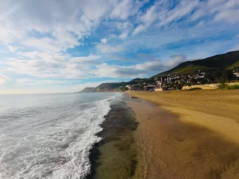 Beach, waves, mountains Stock Footage 304763871
