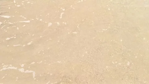 Beach waves moving to the shore during summer morn Stock Footage 295479140