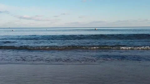 Beach with waves sand and seagulls Stock Footage 142470906
