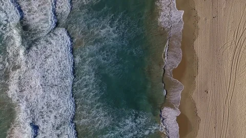 Beach waves sand summer birds eye aerial footage Stock Footage 99498688