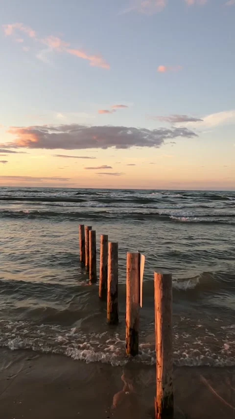 Beach waves slow motion sunset Stock Footage 211851362