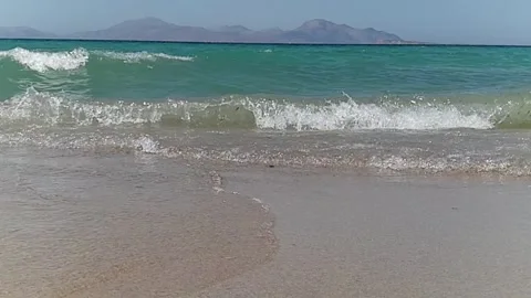 Beach waves slow motion video. Sea waves. Beautiful footage of wavy water on a Stock Footage 136356928