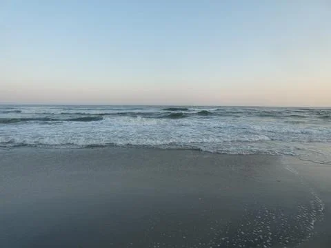 Beach Waves at Sunset Stock Photos