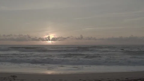 Beach waves at sunset in Portugal Stock Footage 238408130