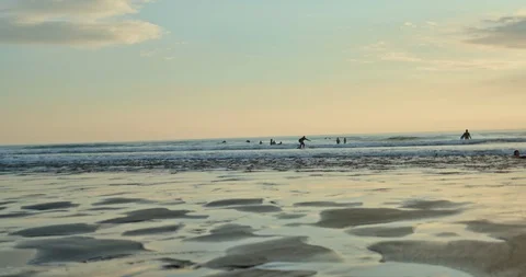 Beach with Waves Sunset Surfer Stock Footage 91940937
