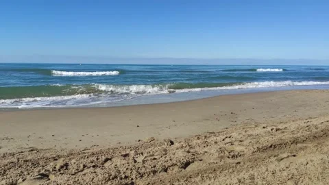 Beach waves view , timelapse.Sunny day of summer in Mediterranean Sea. Stock Footage 136283730