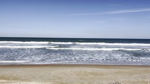 Beach waves on windy day Stock Footage 236508996
