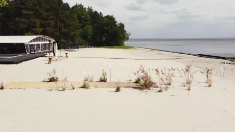 Beach wedding ceremony, wedding decor. Side view of drone flying around wedding Stock Footage 321944436
