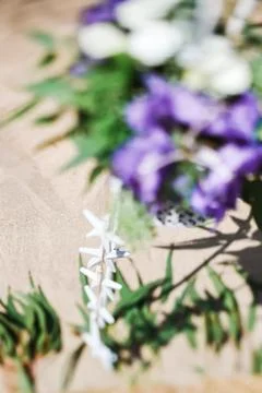 Beach Wedding Decorations Made Of Violet Flowers Stock Photos