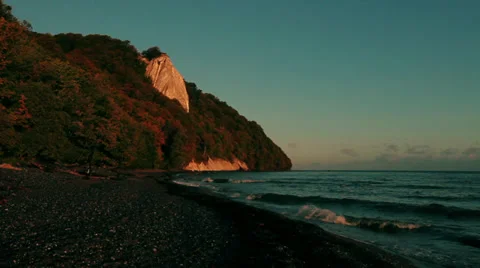 Beach While Sunset With Autumn Forest And Chalk Cliff  On Rügen Island Stock Footage 37208530